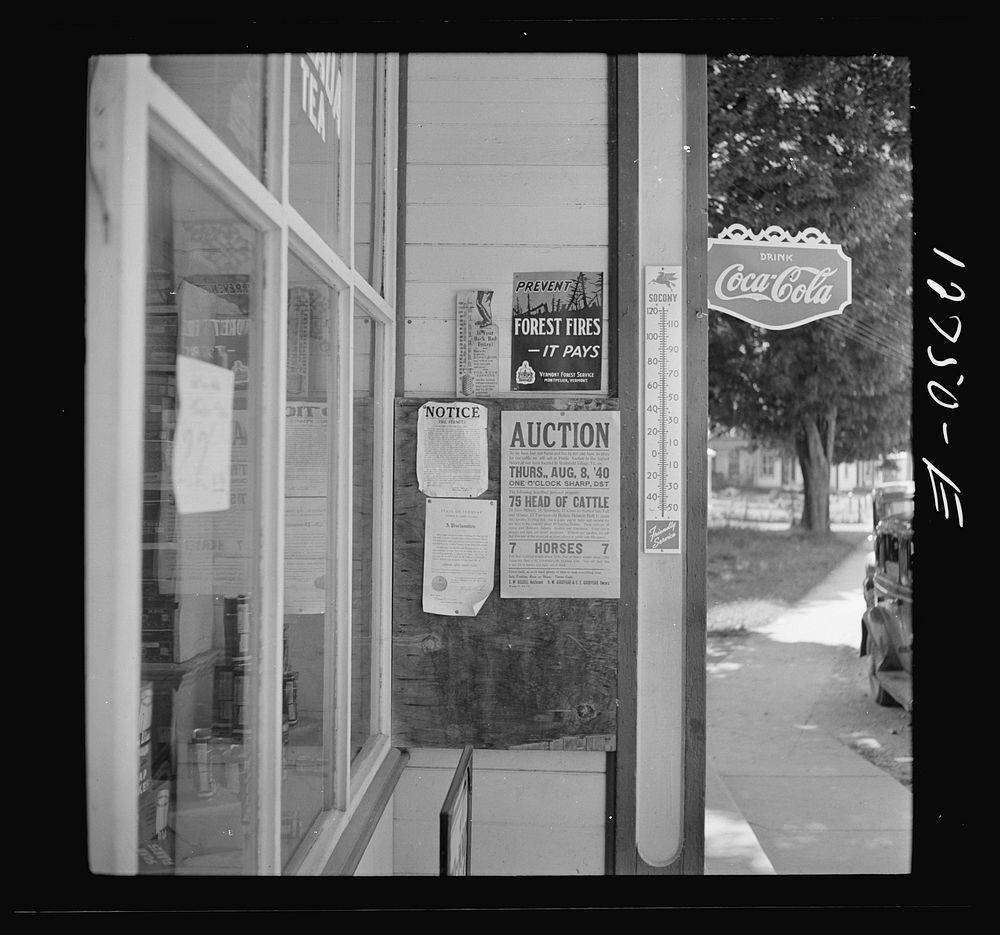 Signs outside general store. Lincoln, Vermont. Sourced from the Library of Congress.