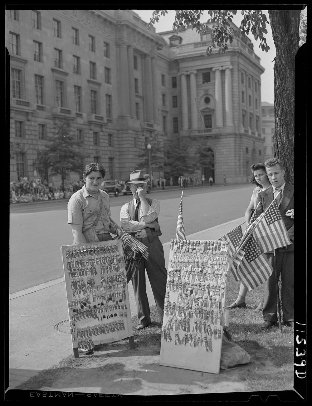 Washington, D.C. Flag and badge vendor at the Memorial Day parade. Sourced from the Library of Congress.