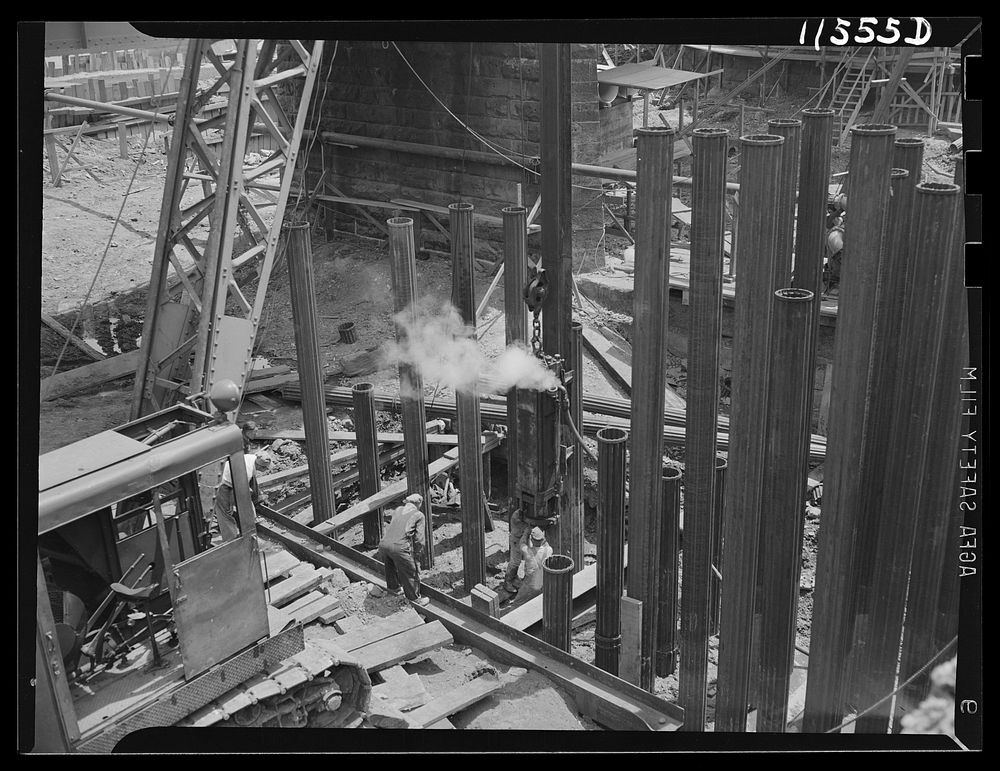 Washington, D.C. Adjusting pile driver at lower 14th Street improvement project. Sourced from the Library of Congress.