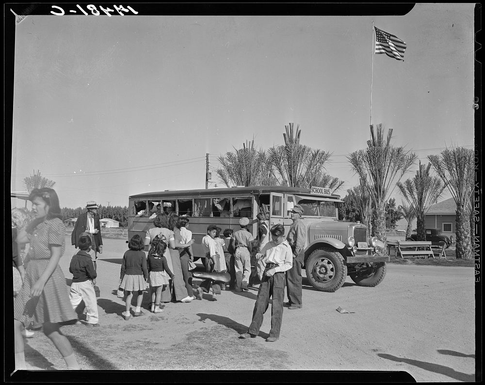 At the farmworkers' community at Indio, California, the newly-acquired school bus picks up one of its three loads of fifty…