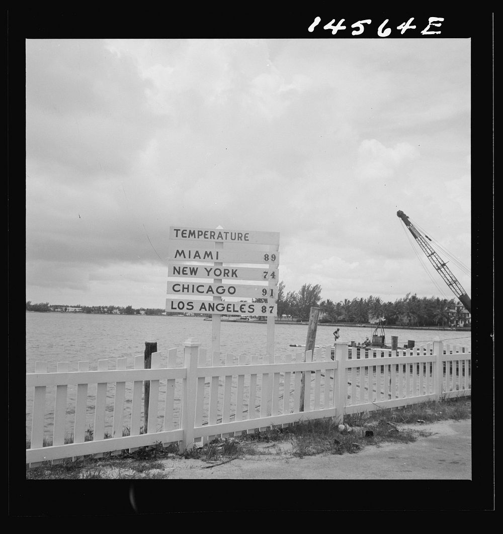 Daily temperature readings are seen on Venetian Causeway between Miami and Miami Beach, Florida. Sourced from the Library of…