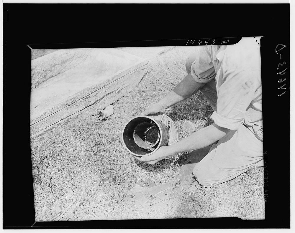 Milaca, Minnesota. Well pit eliminated by installation of pipe and water pump. Sourced from the Library of Congress.