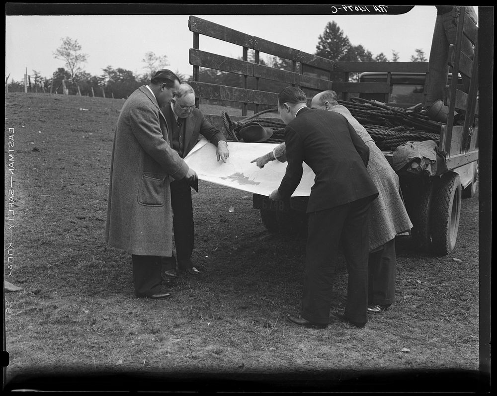 Officials examining plan Greenbelt, Maryland. | Free Photo - rawpixel