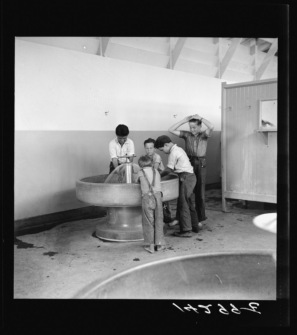 Mens' lavatory. Visalia migratory labor camp, California. Sourced from the Library of Congress.
