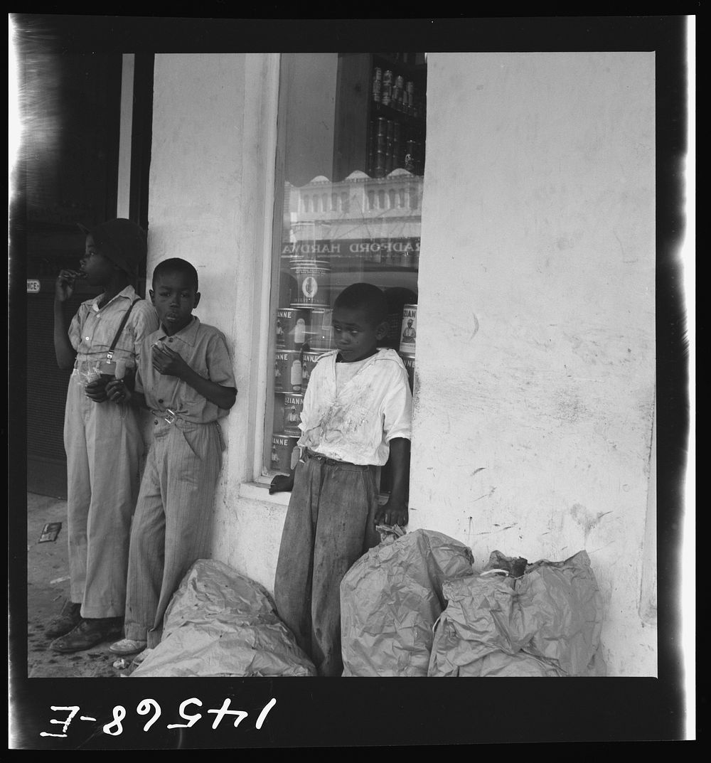 [Untitled photo, possibly related to:  boys eating popsicles. At Starke, Florida]. Sourced from the Library of Congress.