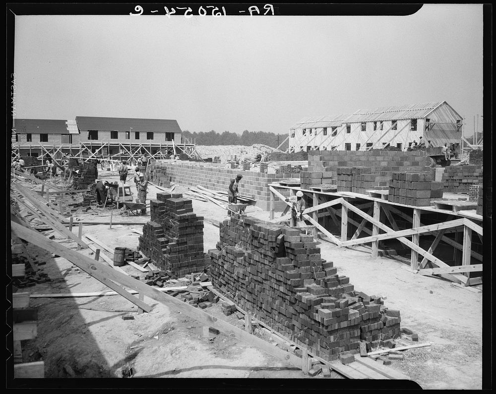 [Untitled photo, possibly related to: Row house under construction. Greenbelt, Maryland]. Sourced from the Library of…