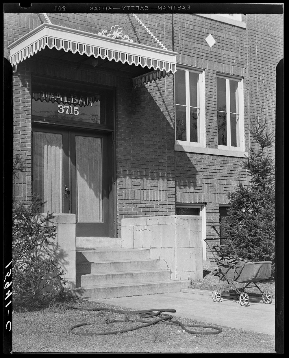 Entrance to apartment building. Washington, D.C.. Sourced from the Library of Congress.