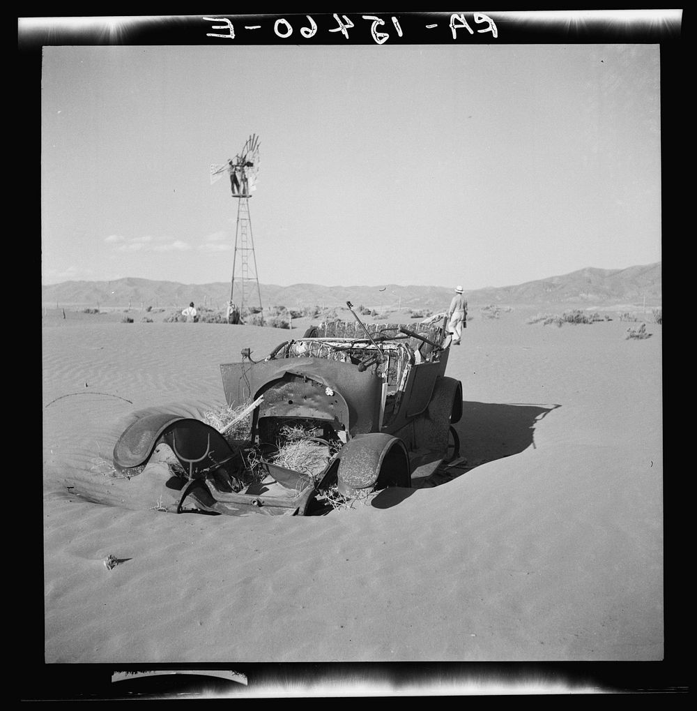 Wind erosion is covering remains of unsuccessful farm in Idaho. Sourced from the Library of Congress.