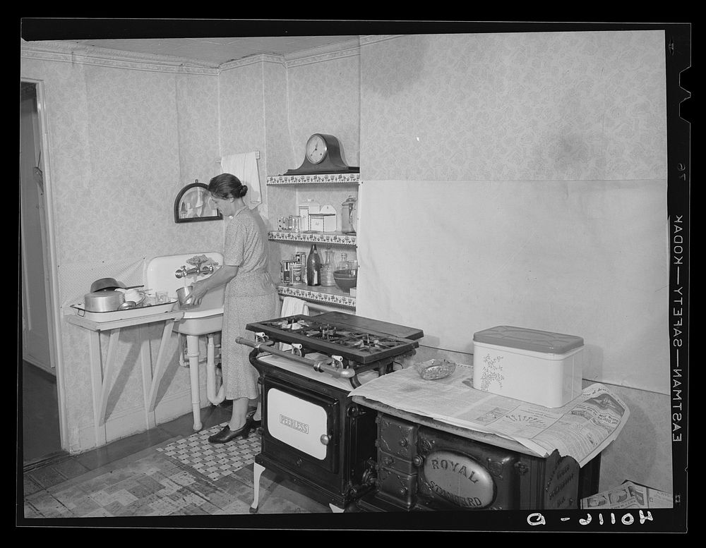 New York, New York. John Montefiori's sister-in-law in her kitchen at 340 East 63rd Street. Sourced from the Library of…