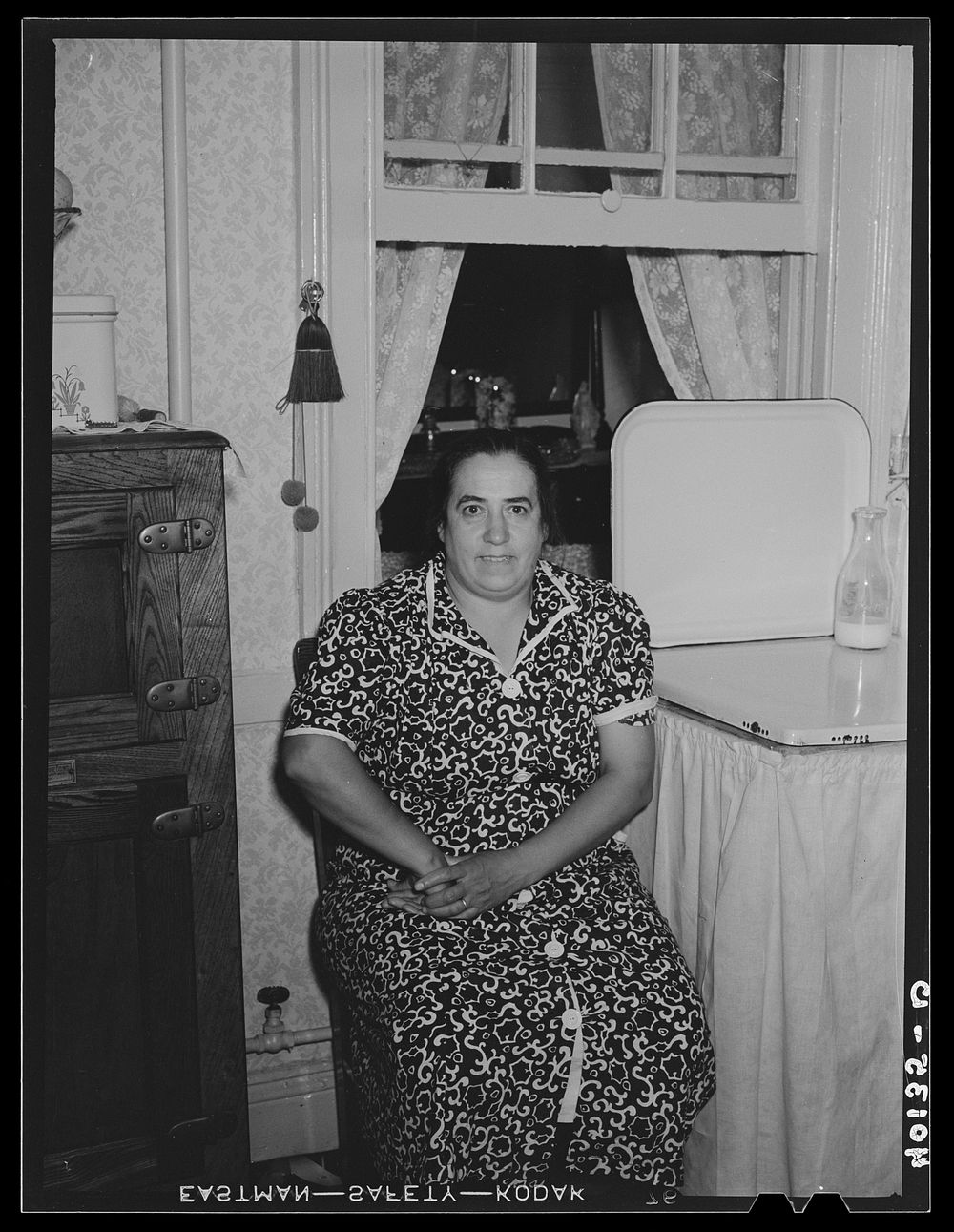 Mrs. Montefiori at the kitchen of her apartment. 340 East 63rd Street. Sourced from the Library of Congress.