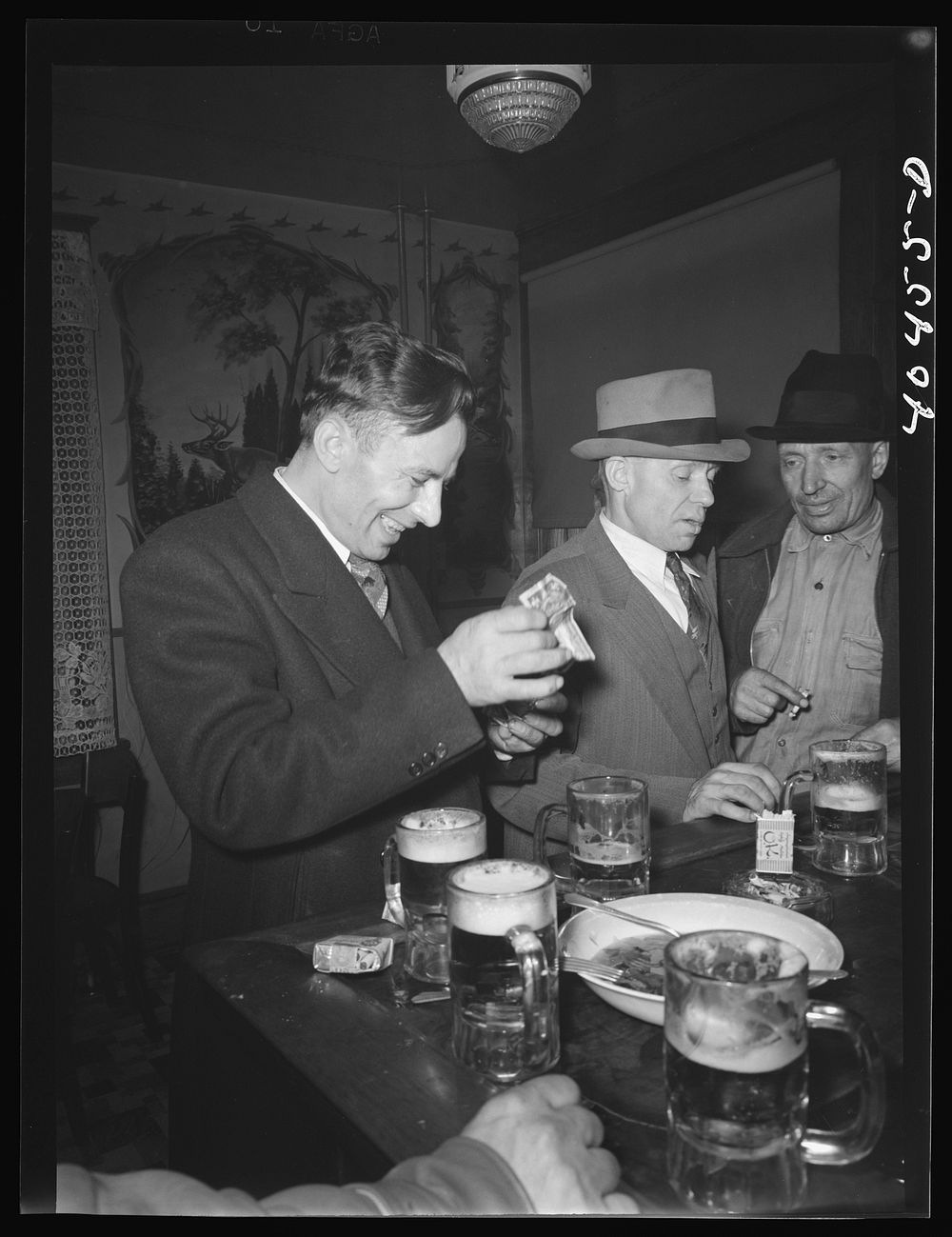 Shenandoah, Pennsylvania. Filipek's barroom where men are having lunch. Sourced from the Library of Congress.