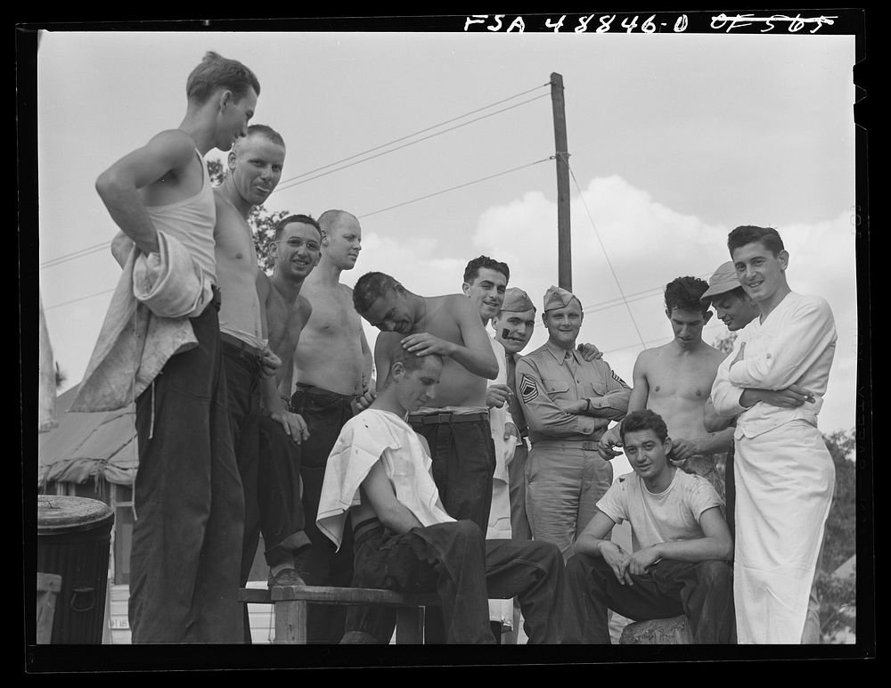 Camp Shelby, Hattiesburg, Mississippi. Getting a haircut. Sourced from the Library of Congress.