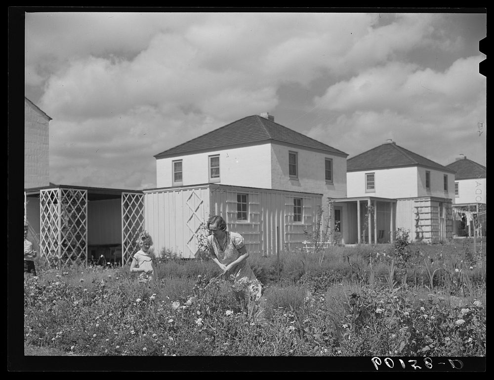 Resident of Greendale, Wisconsin, working in garden. Sourced from the Library of Congress.