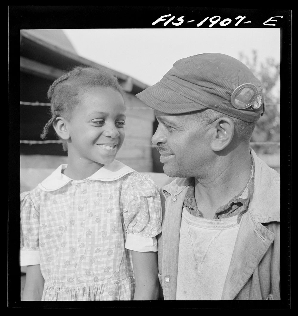 Newport News, Virginia.  shipyard worker and one of his daughters. Sourced from the Library of Congress.