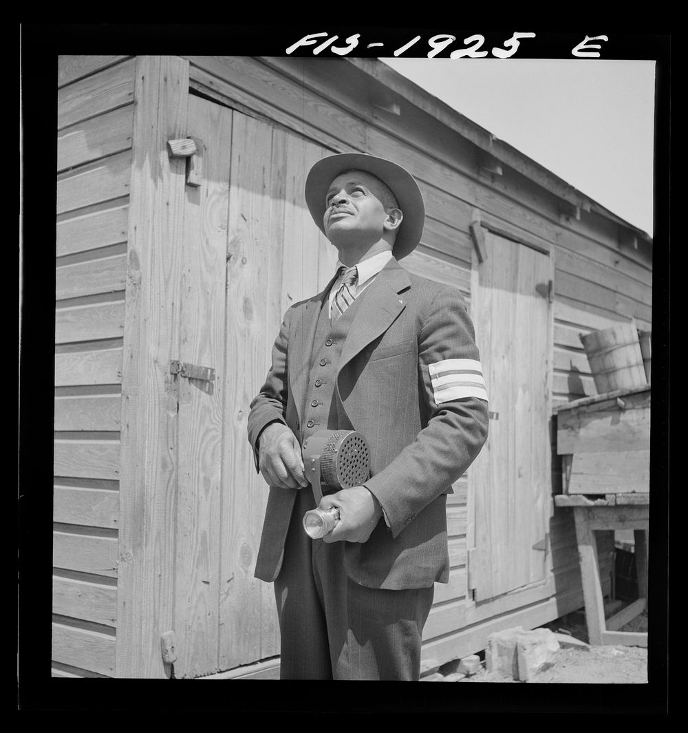 [Untitled photo, possibly related to: Newport News, Virginia.  shipyard worker does volunteer duty as an air raid warden].…