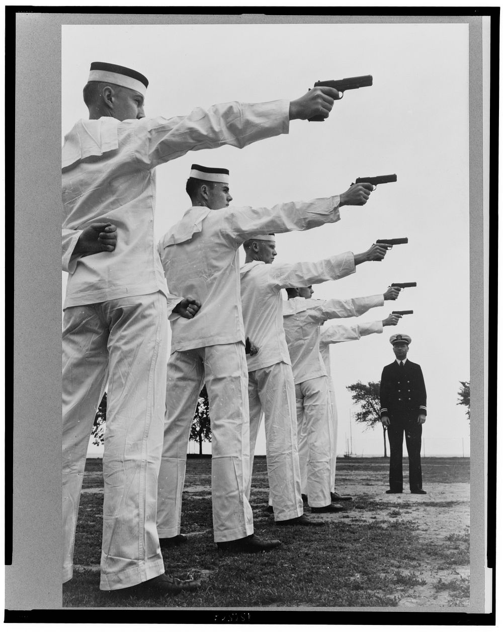 U.S. Naval Academy, Annapolis, Maryland. Instruction in pistol shooting. Sourced from the Library of Congress.