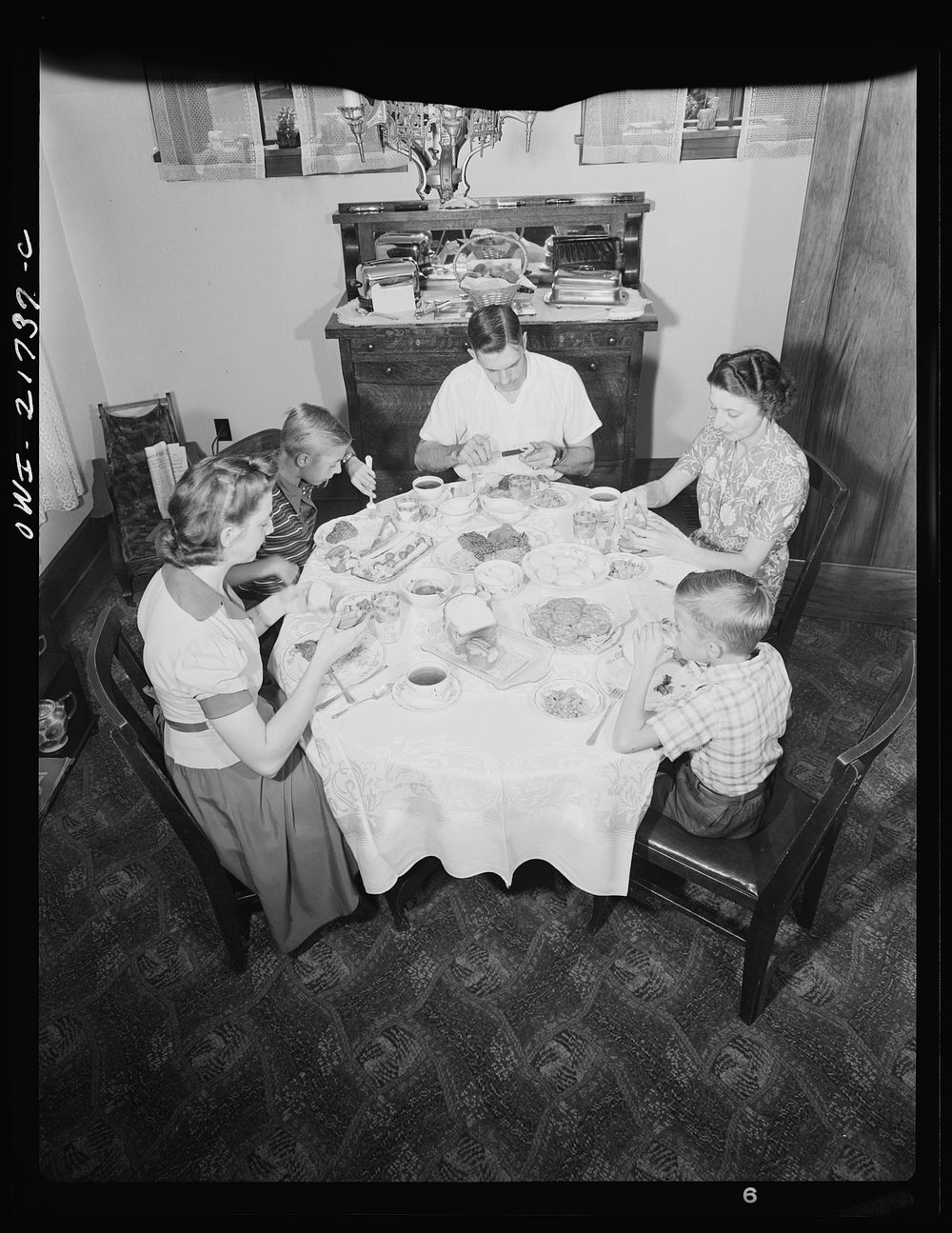Rochester, New York. The Babcocks at the dinner table. Sourced from the Library of Congress.