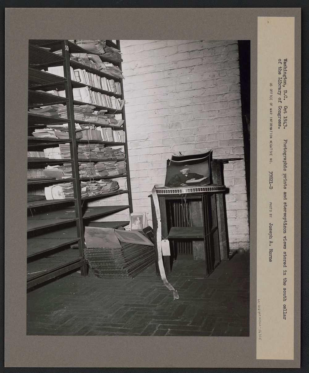 [Untitled negative showing photographic prints and steropticon views stored in the south cellar of the Library of Congress].…