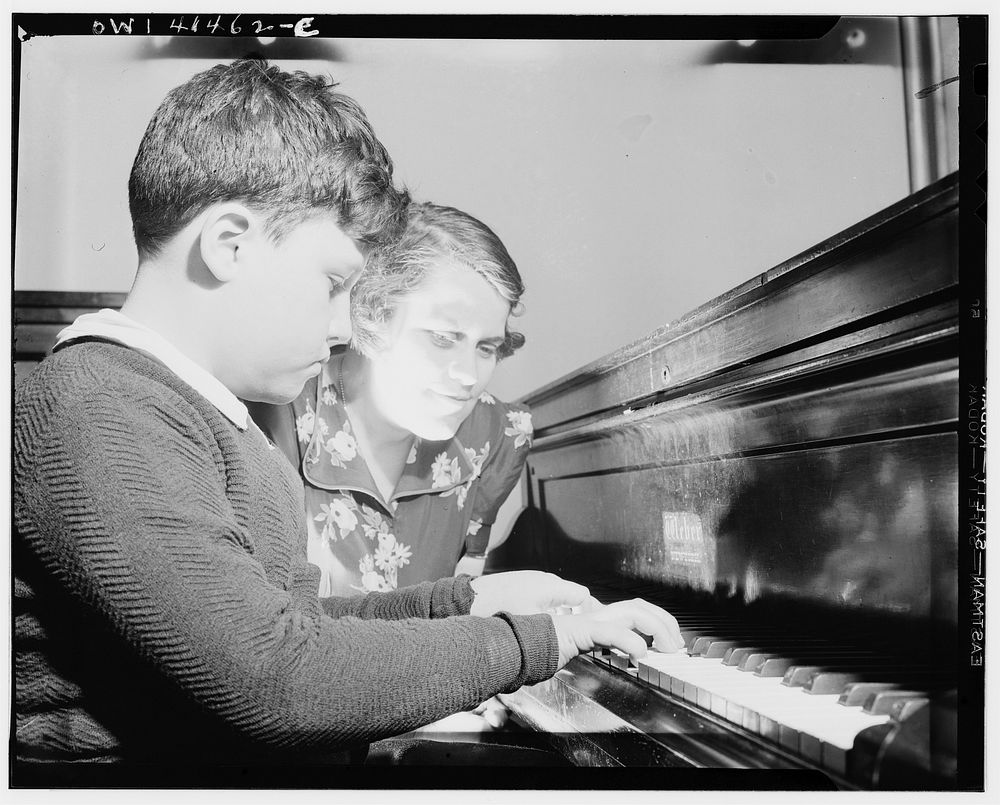 New York, New York. A blind youngster getting his weekly piano lesson at the Lighthouse, an institution for the blind, at…