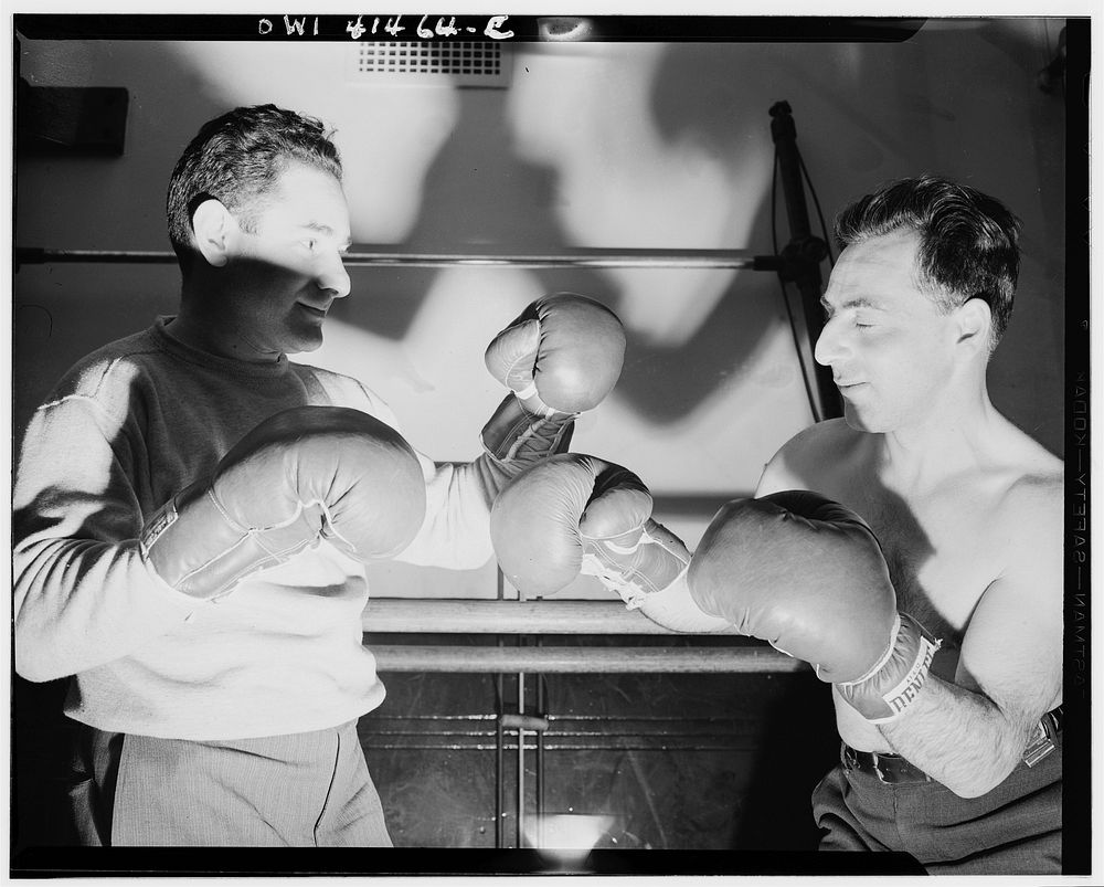 New York, New York. Boxing instructor, Maurice Case, giving instructions to Joe Brun at the Lighthouse, an institution for…