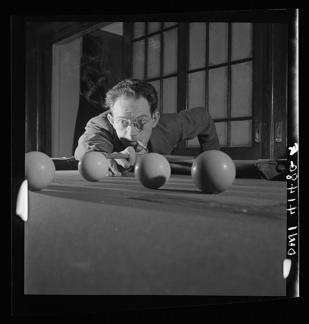 New York, New York. Bill Riley, who has partial sight, shown playing pool at the Lighthouse, an institution for the blind…