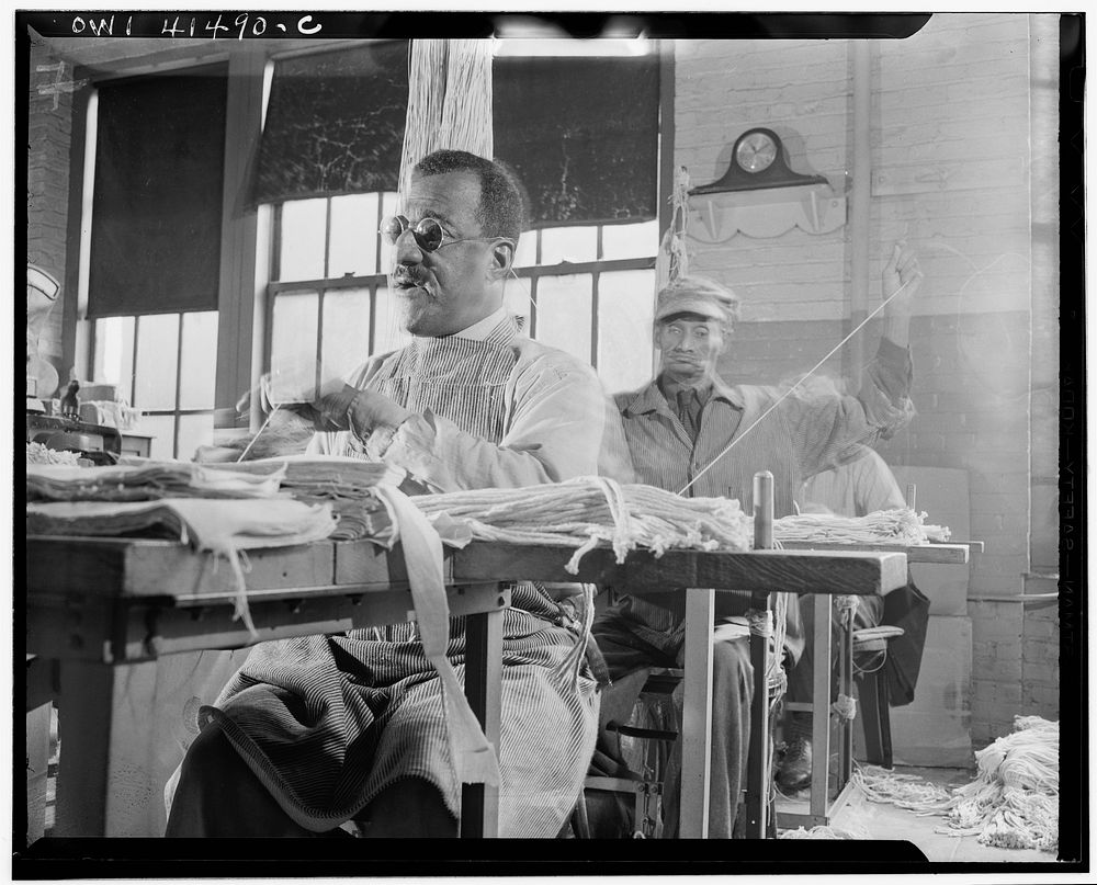 New York, New York. Blind men sewing mops by hand at the Lighthouse, an institution for the blind, at 111 East Fifty-ninth…