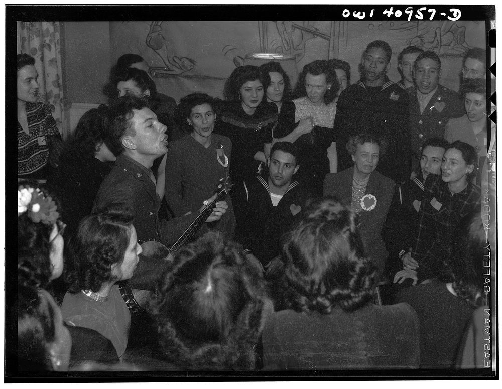 [Untitled photo, possibly related to: Washington, D.C. Pete Seeger, noted folk singer, leading the crowd in "When We March…