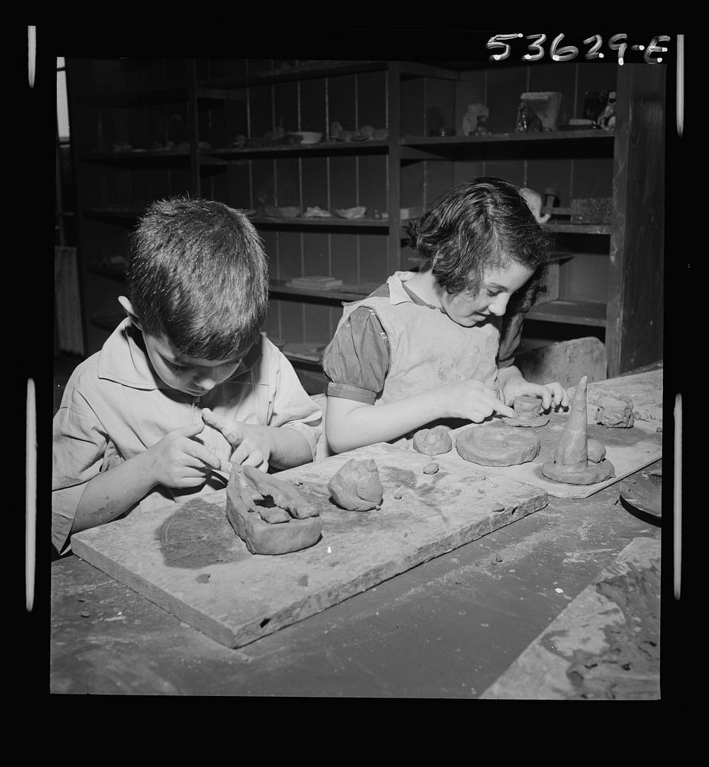 New York, New York. Two children of working mothers, developing their favorite hobbies during after school hours at…