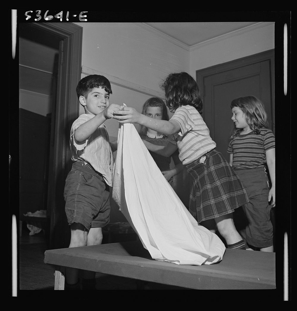 New York, New York. Children of working mothers who receive day care with educational recreation and rest at Greenwich…