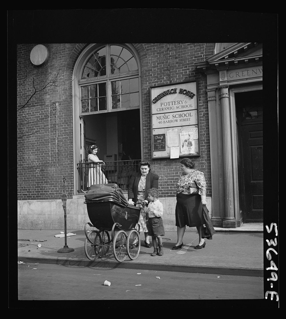 New York, New York. Two working mothers calling for children at Greenwich House, a neighborhood center, where they have left…
