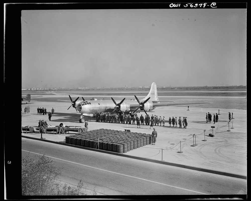 B-29 Super Fortress on display at Washington National Airport. Note fuel tanks in foreground which is necessary to fill fuel…