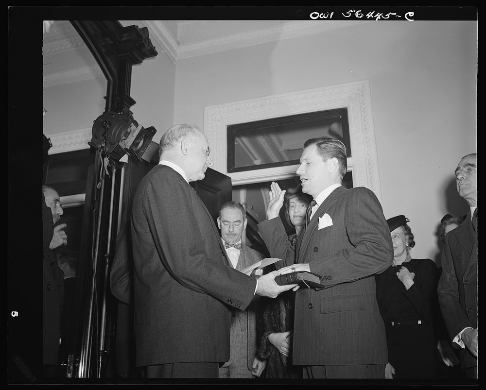 Justice Reed administering oath of office to Nelson A. Rockefeller, Assistant Secretary (American Republic Affairs), U.S.…