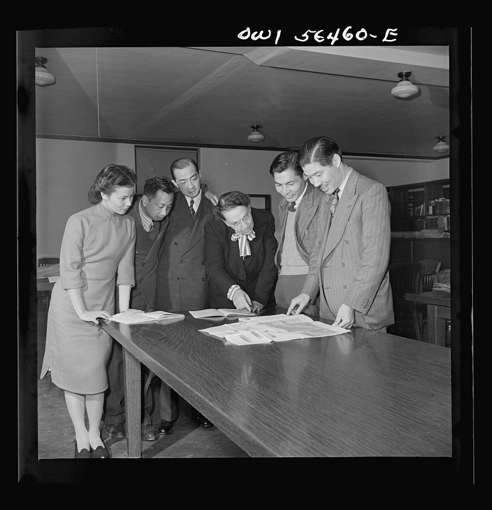 Chinese technical experts inspect reference material in University of Maryland library where they are attending UNRRA…