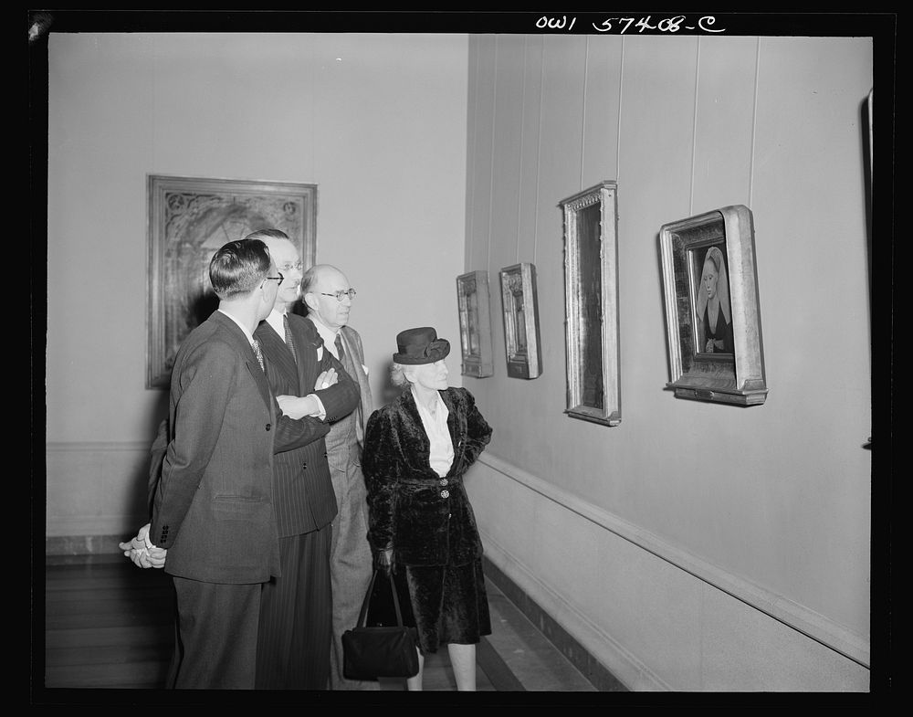 French journalists visit the National Gallery of Art, Washington, D.C., March 4, 1945. Left to right: Pierre Denoyer; Rene…