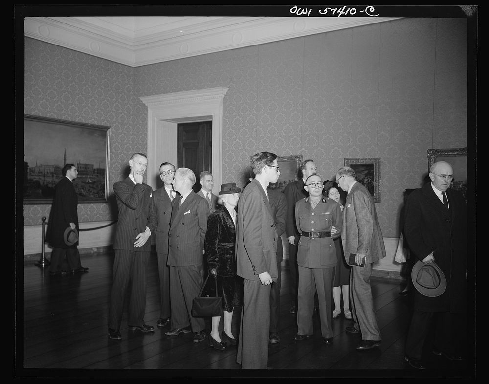 French journalists visit the National Gallery of Art, Washington, D.C., March 4, 1945, where they are  shown around by Rene…