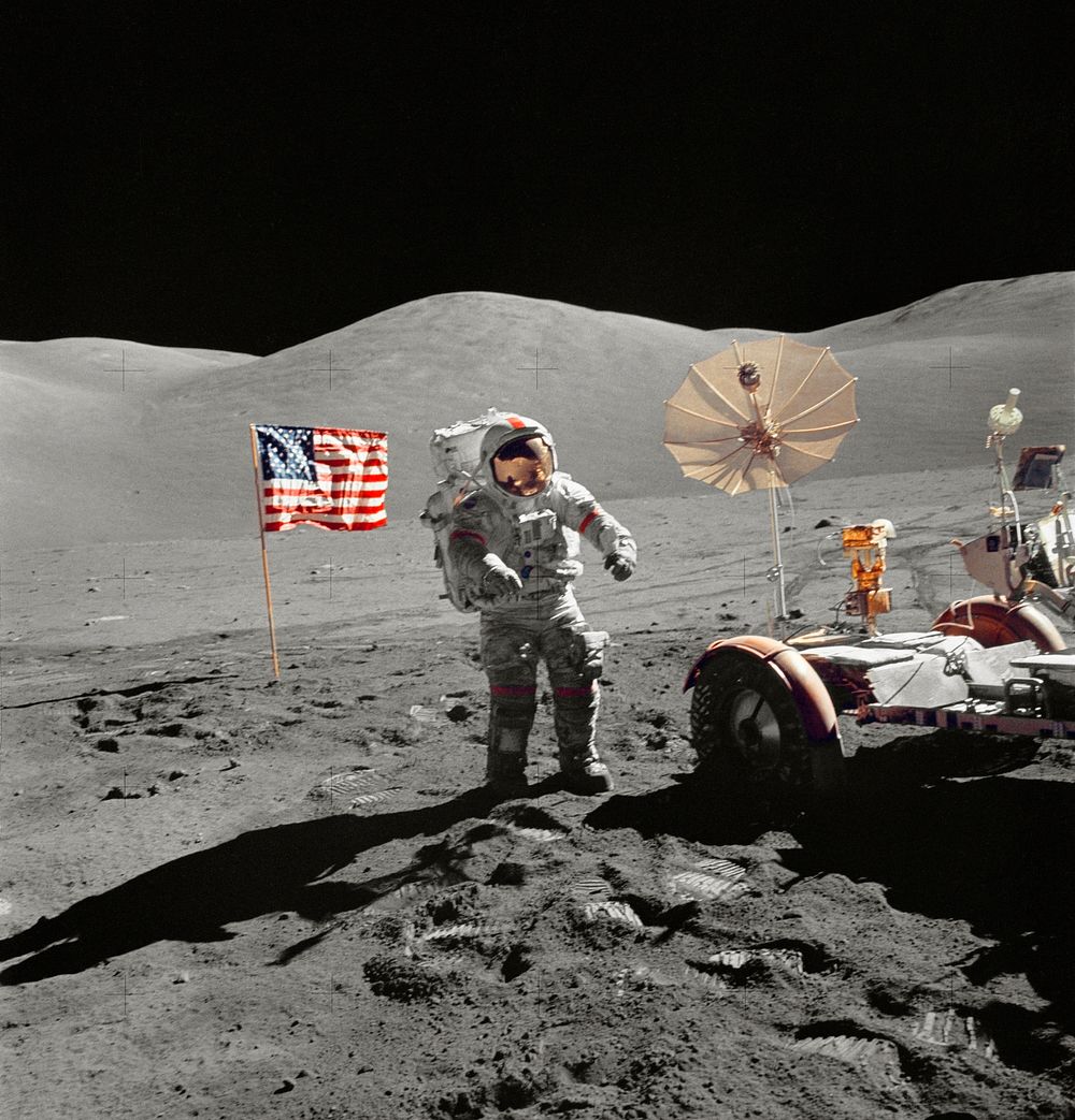 Astronaut Eugene A. Cernan, walks toward the Lunar Roving Vehicle during extravehicular activity at the Taurus-Littrow…