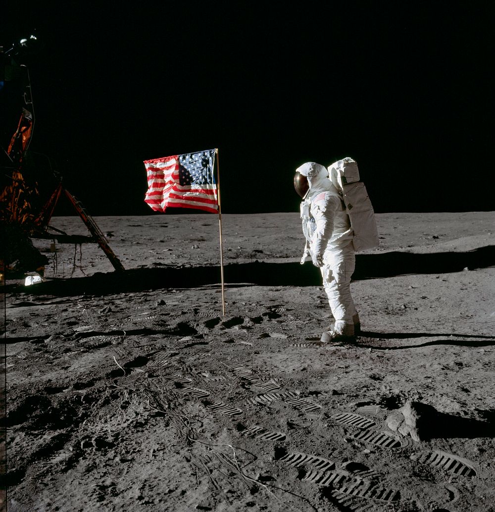Astronaut Edwin E. Aldrin Jr., beside the deployed United States flag during an Apollo 11 extravehicular activity on the…