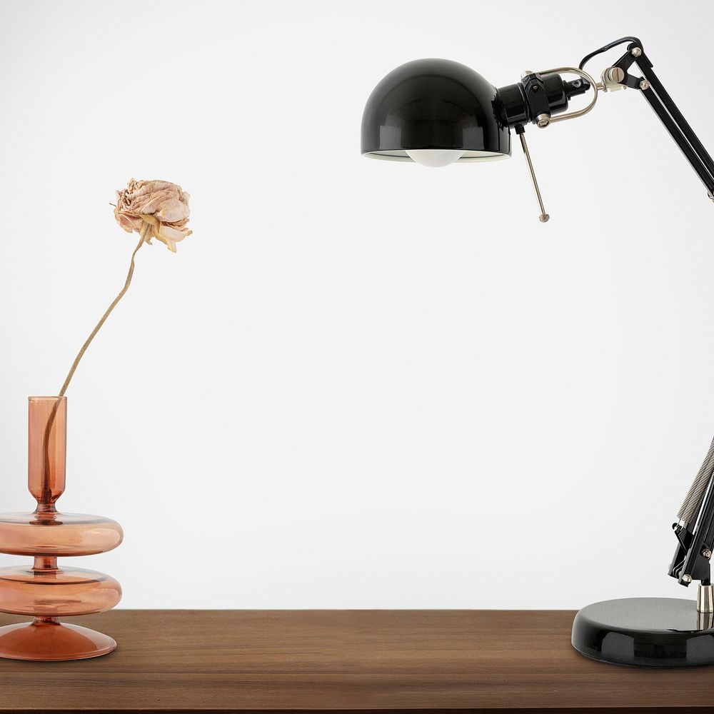 Black desk lamp on a wooden table