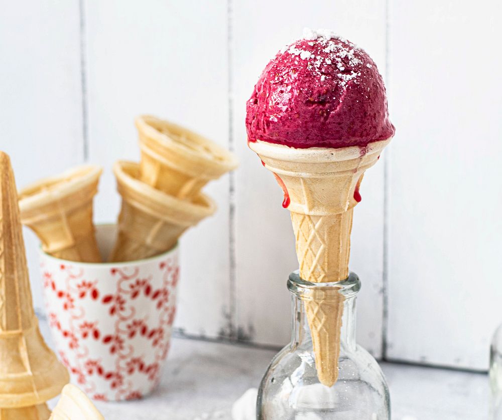 Raspberry ice cream cone in a a glass bottle