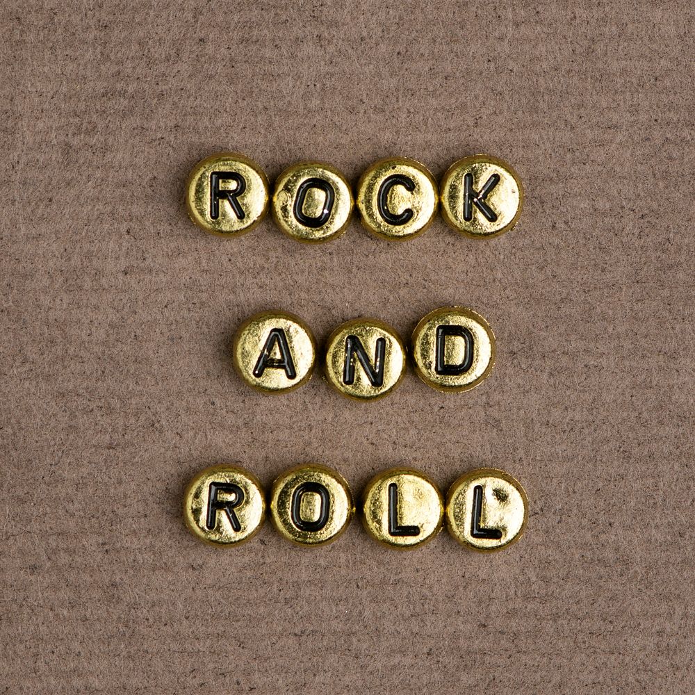 Gold ROCK AND ROLL beads word typography