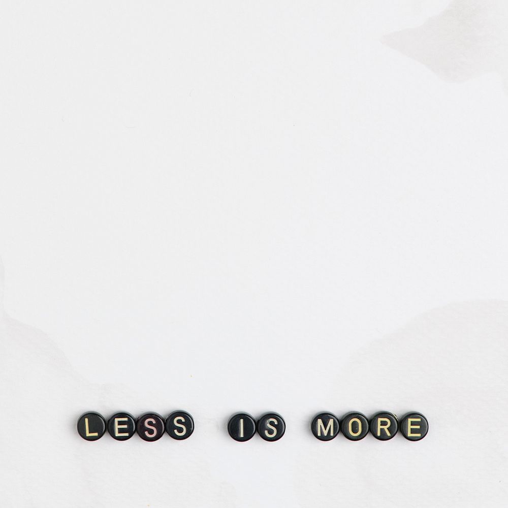 LESS IS MORE beads message typography with copy space