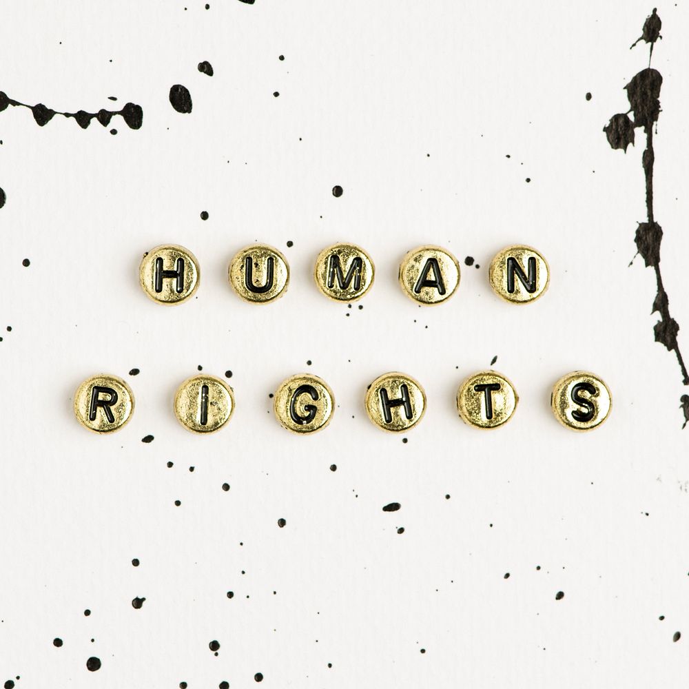 Gold human rights word beads alphabet