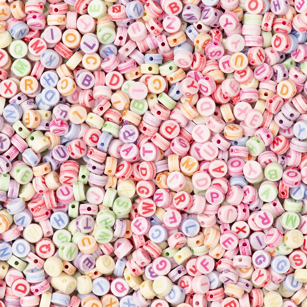 Pastel English letter beads background