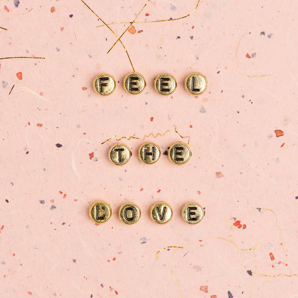 FEEL THE LOVE beads word typography