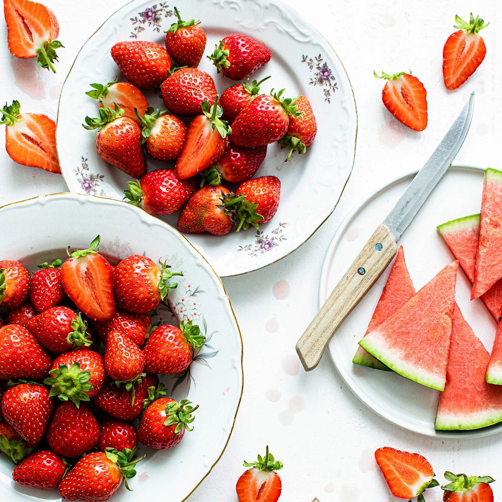 Watermelon and strawberry on white table