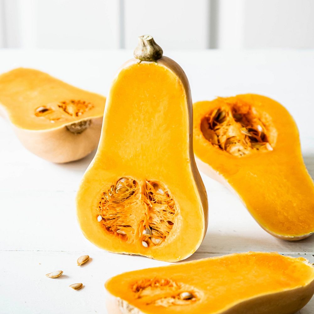 Butternut squash on white wooden table