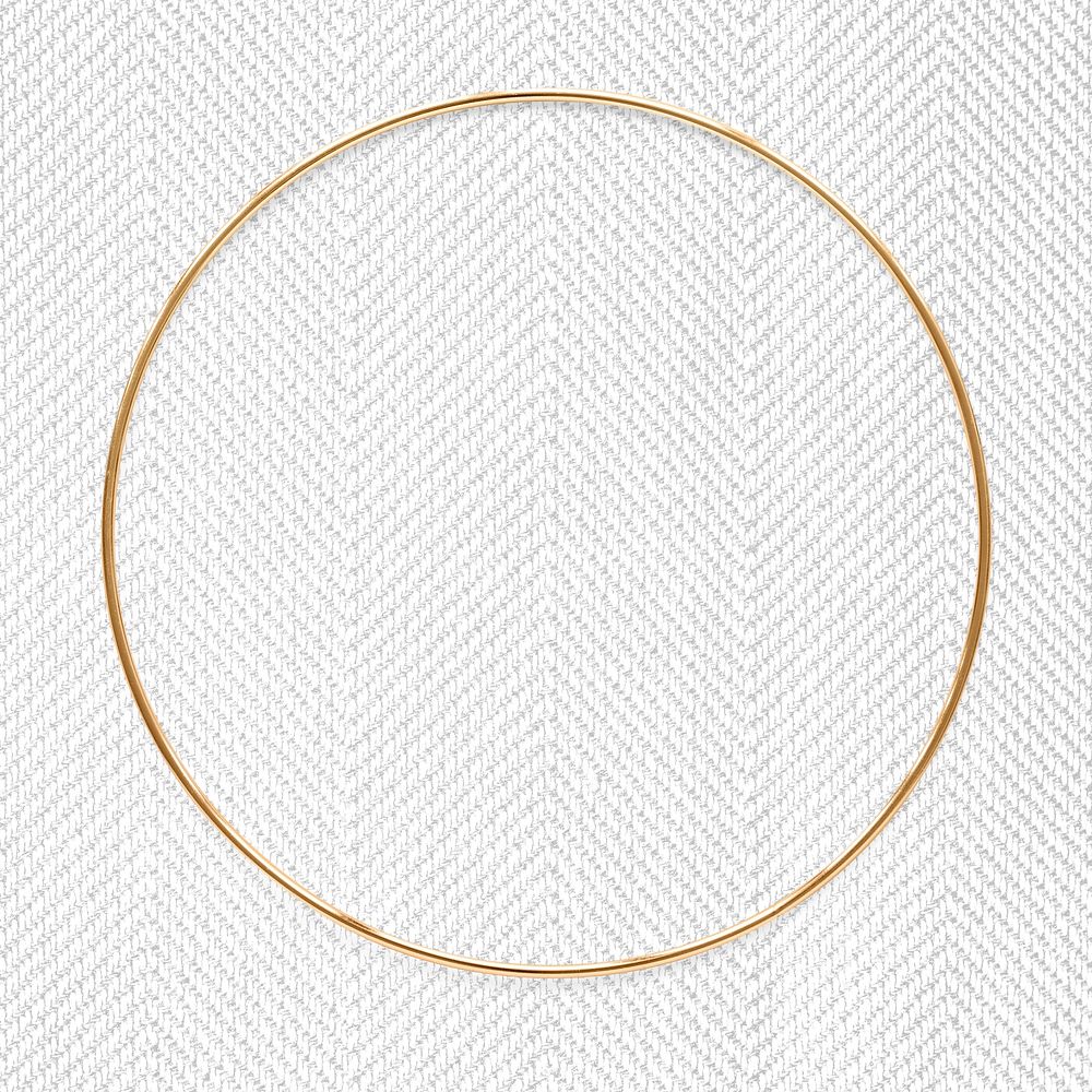 Round gold frame on a white textured background