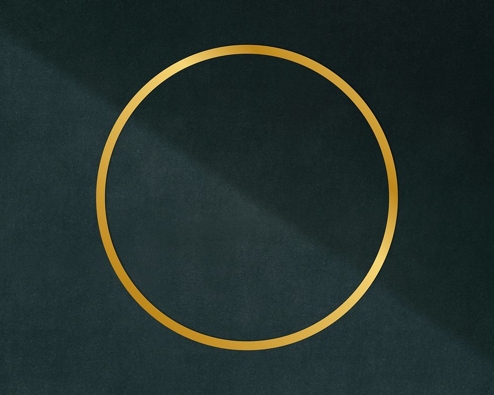 Gold circle frame on a dark gray concrete textured background