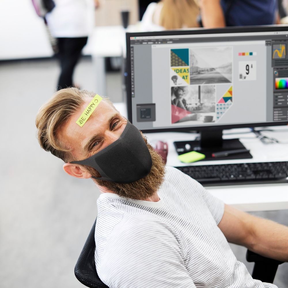 Covid 19, Employee in the new normal wearing mask