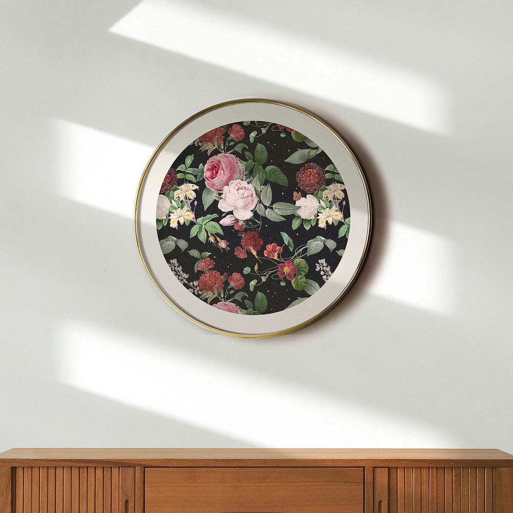 Framed colorful flowers psd pattern hanging on the wall mockup